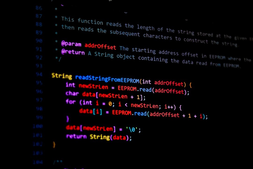 Code on computer screen with dark background