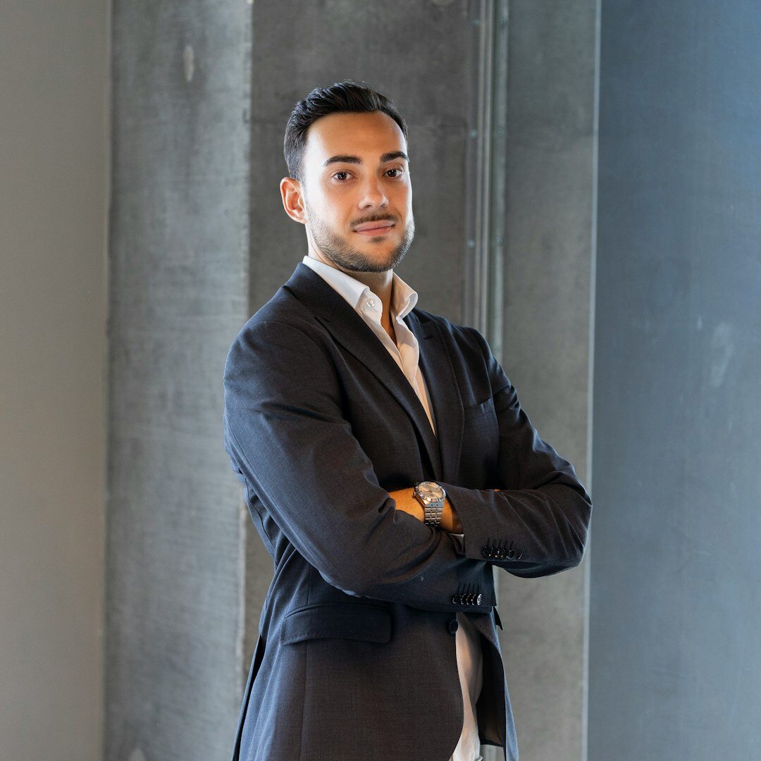 Professional headshot of a male tech director